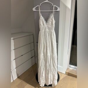 Brand new with tags white maxi long open back dress size XS.